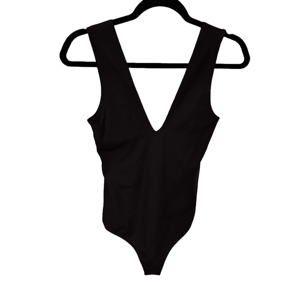 Free People Woman’s Keep It Sleek Bodysuit size XS solid Black Deep V NWOT - Picture 3 of 9